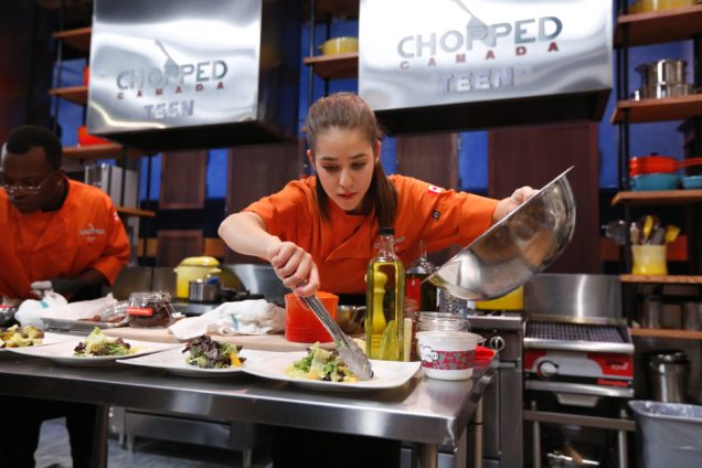 Young girl cooking in the Chopped Canada kitchen set.